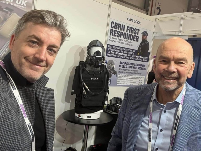 CAM Lock representatives at Security & Policing exhibition stand displaying CBRN first responder equipment